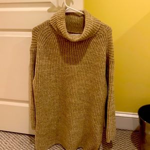 Oversized chunky turtle neck sweater. Beige in color. Very warm. Never worn